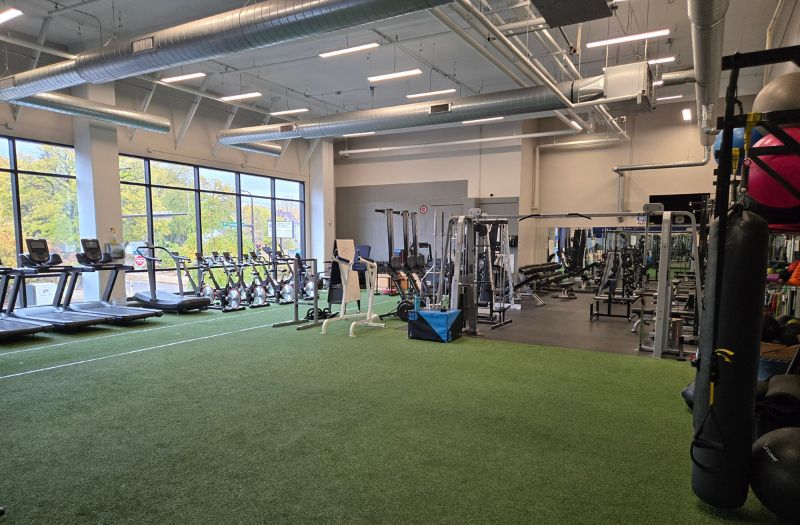 Premium gyms in Minneapolis, MN featuring an uncrowded indoor turf training area.